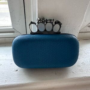 Blue Clutch with Knuckle Rings